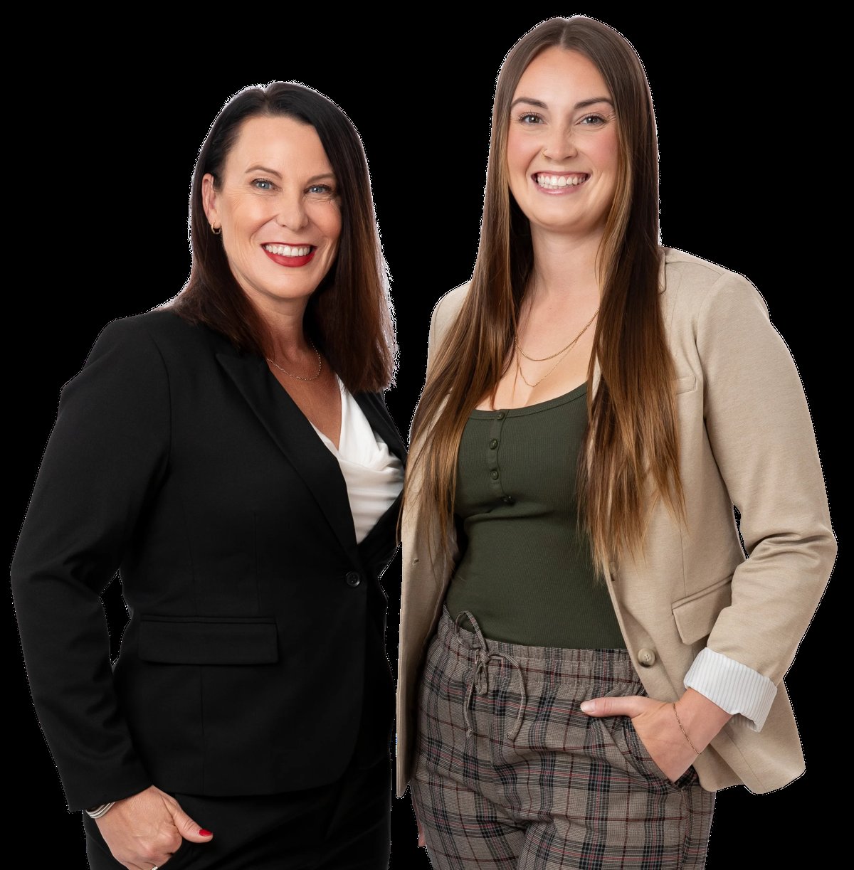 Two professional women posing together against a black background, smiling at the camera